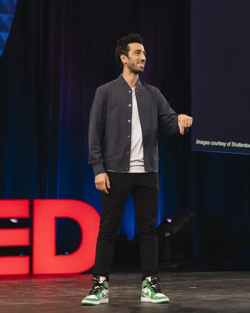Jon Youshaei speaking on the TED stage